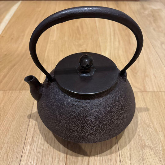 Josei Sato Nambu Tekki Tetsubin Kettle Cast Iron with Tomobako, Plum Finial