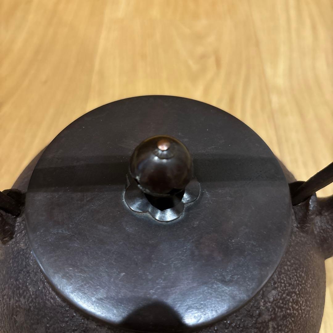 Josei Sato Nambu Tekki Tetsubin Kettle Cast Iron with Tomobako, Plum Finial