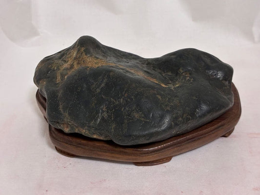 Kamuikotan Suiseki Viewing Stone Black Stone with Wooden Stand from Hokkaido, Width approx. 12.5 cm